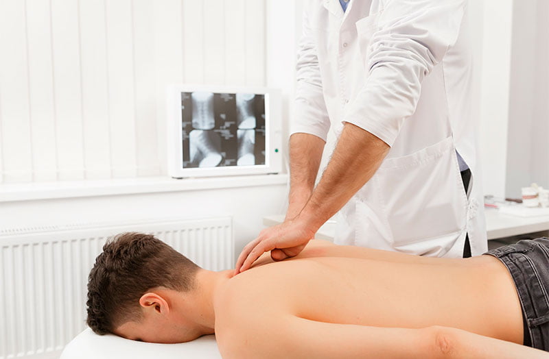 Neck Pain Chiropractor Treatment of a patient